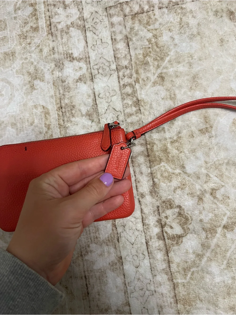 Coach Pebbled Leather Wristlet in Salmon